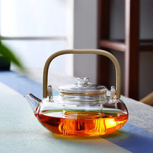 Load image into Gallery viewer, Glass Teapot On Stove with Bamboo Handle | Borosilicate Tea Kettle - 1 Pc