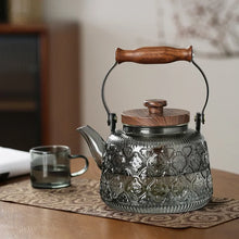 Load image into Gallery viewer, Walnut Handle Glass Teapot on Stove | High Borosilicate Tea Infuser Kettle