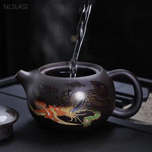 Load image into Gallery viewer, Dragon Phoenix Yixing Teapot | Black Painting Reveal Clay Tea Pot with Hot Water - 1 Pc