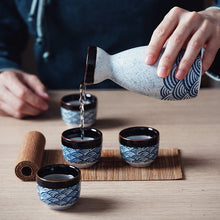 Load image into Gallery viewer, Blue Waves Sake Set | Japanese Painted Ceramic Tokkuri Bottle and Ochoko Cup - 5 Pc