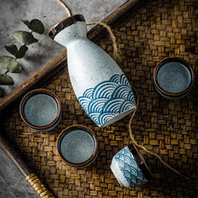 Load image into Gallery viewer, Blue Waves Sake Set | Japanese Painted Ceramic Tokkuri Bottle and Ochoko Cup - 5 Pc